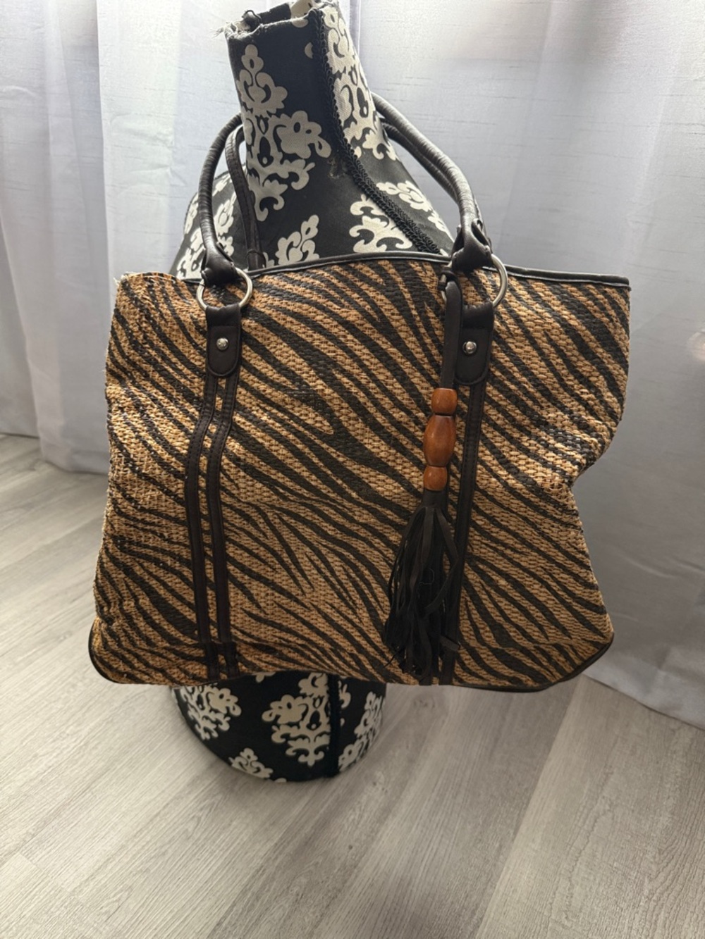 New York & Company Brown and Black Zebra-Print Woven Tote with Tassel